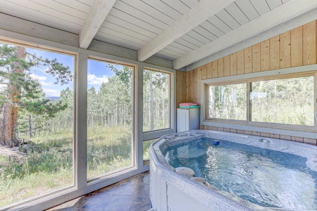 Airy Forest Escape with Mountain Views and Hot Tub! photo 2