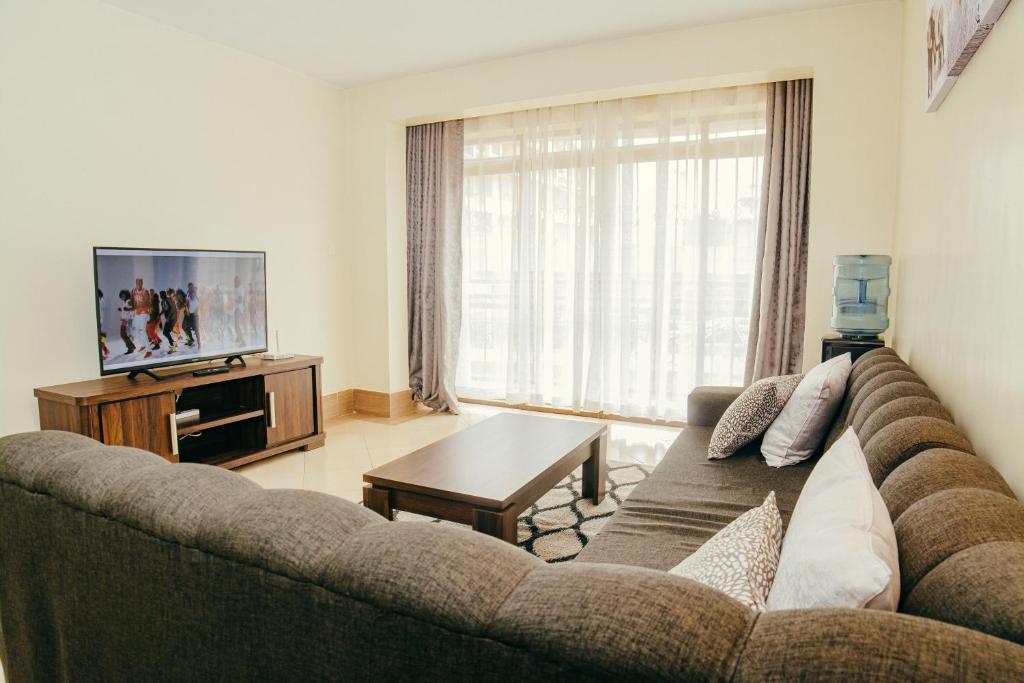 Elegant Art Deco Home with Free Wi-Fi, Parking, Netflix, Office Desk, Computer & Baby Cot in Ruaka photo 4