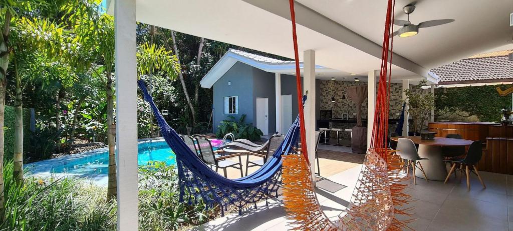 Casa c/ área gourmet e piscina na praia de Riviera photo 2