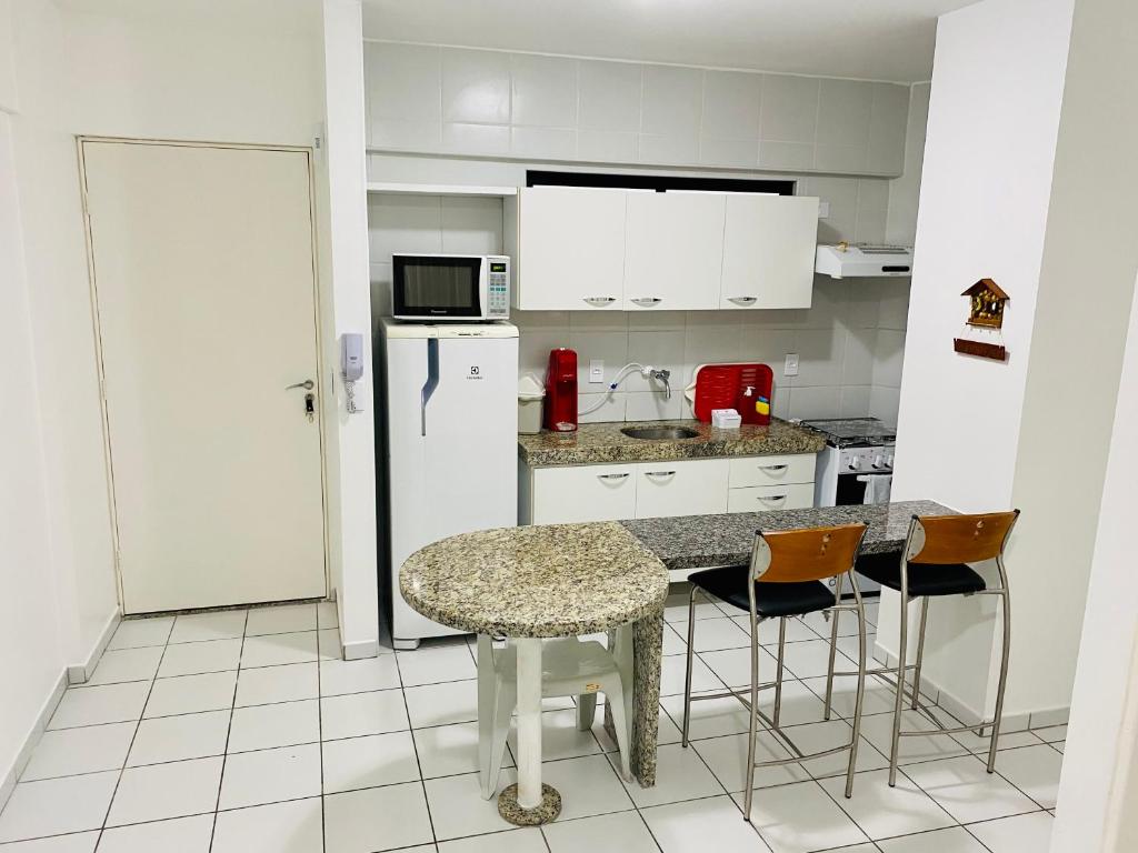 Quarto e sala com piscina próximo à praia photo 3