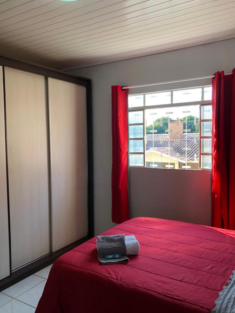 Quarto Privado no Coração de Foz - casa e banheiro compartilhado photo 2