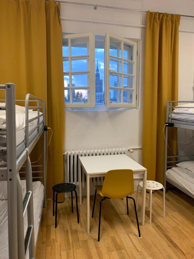 Четырехместный (Четырехместный номер с общей ванной комнатой), New World St. Hostel