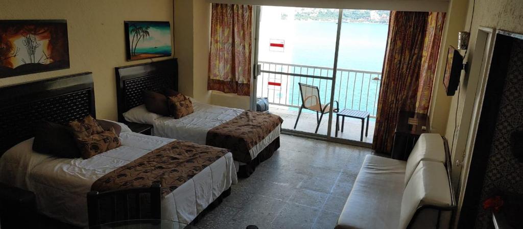 Suite en torres gemelas con vista al mar photo 3