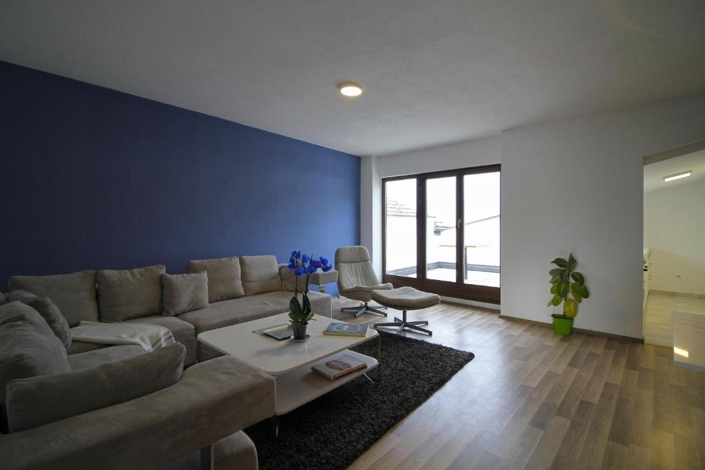 Blue apartment over Prizren roofs photo 2