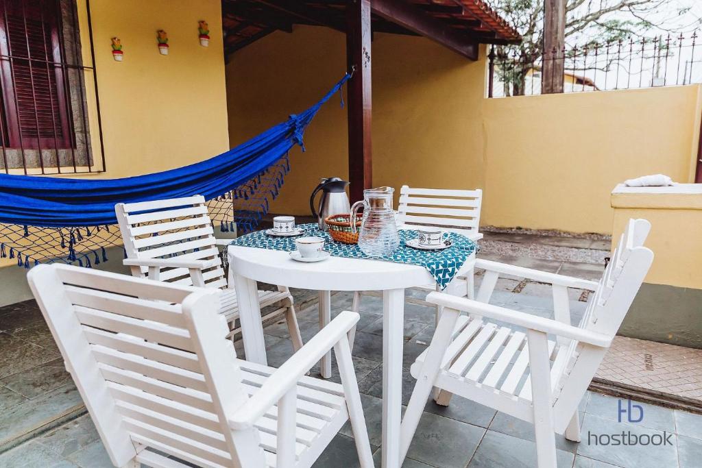 Casa a 300 metros da praia do Centro - WIFI 200MB - Netflix - 2 Quartos - Cozinha equipada - Churrasqueira - Pet friendly - Quintal photo 4