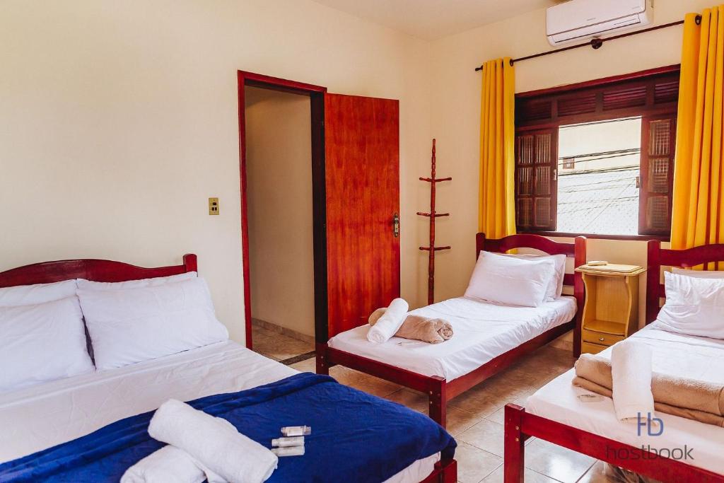 Casa a 300 metros da praia do Centro - WIFI 200MB - Netflix - 2 Quartos - Cozinha equipada - Churrasqueira - Pet friendly - Quintal photo 2