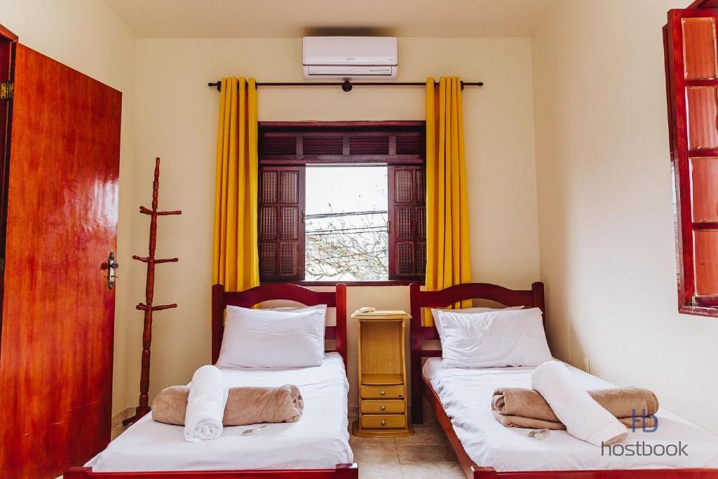 Casa a 300 metros da praia do Centro - WIFI 200MB - Netflix - 2 Quartos - Cozinha equipada - Churrasqueira - Pet friendly - Quintal photo 3