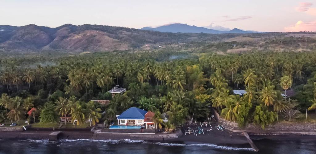 Air Sanih Beach Villa - Tap to explore photos