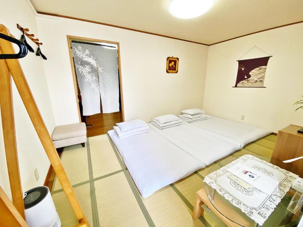 PetitHotel017全室ミニキッチン付きファミリルーム 飲食街中心 阿波踊り会館7分 文理 徳島大学 アスティとくしま車8分 photo 3