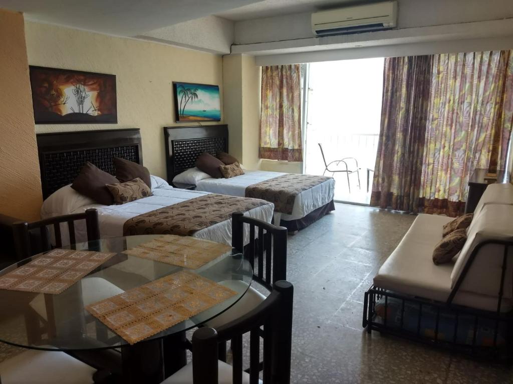 Suite en torres gemelas con vista al mar photo 4