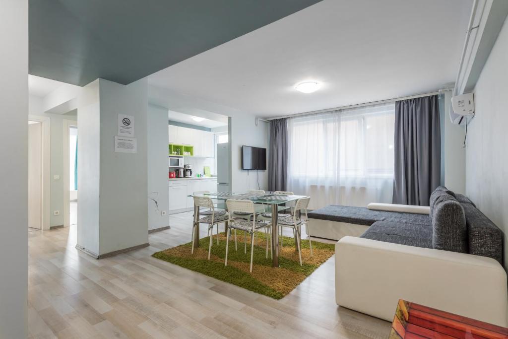 Апартаменты (Апартаменты Делюкс с 3 спальнями), Downtown Accommodation