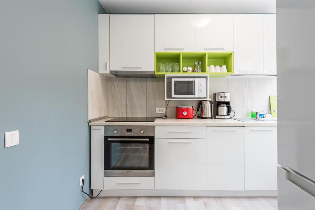 Апартаменты (Апартаменты Делюкс с 3 спальнями), Downtown Accommodation