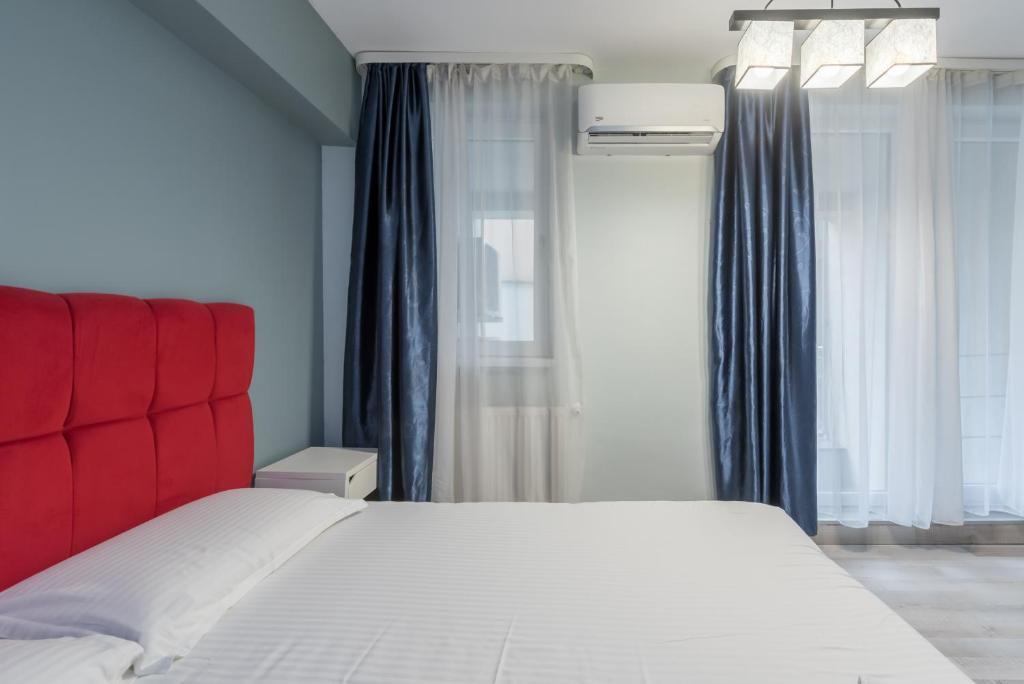 Апартаменты (Апартаменты Делюкс с 3 спальнями), Downtown Accommodation