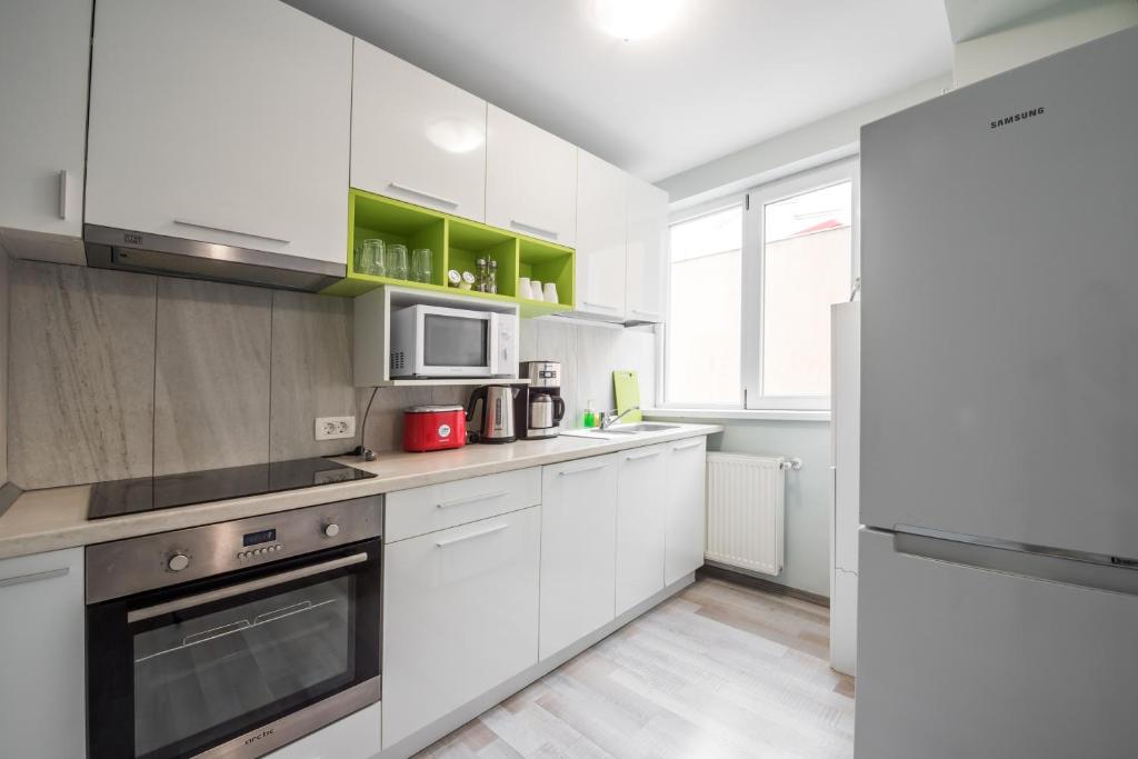 Апартаменты (Апартаменты Делюкс с 3 спальнями), Downtown Accommodation
