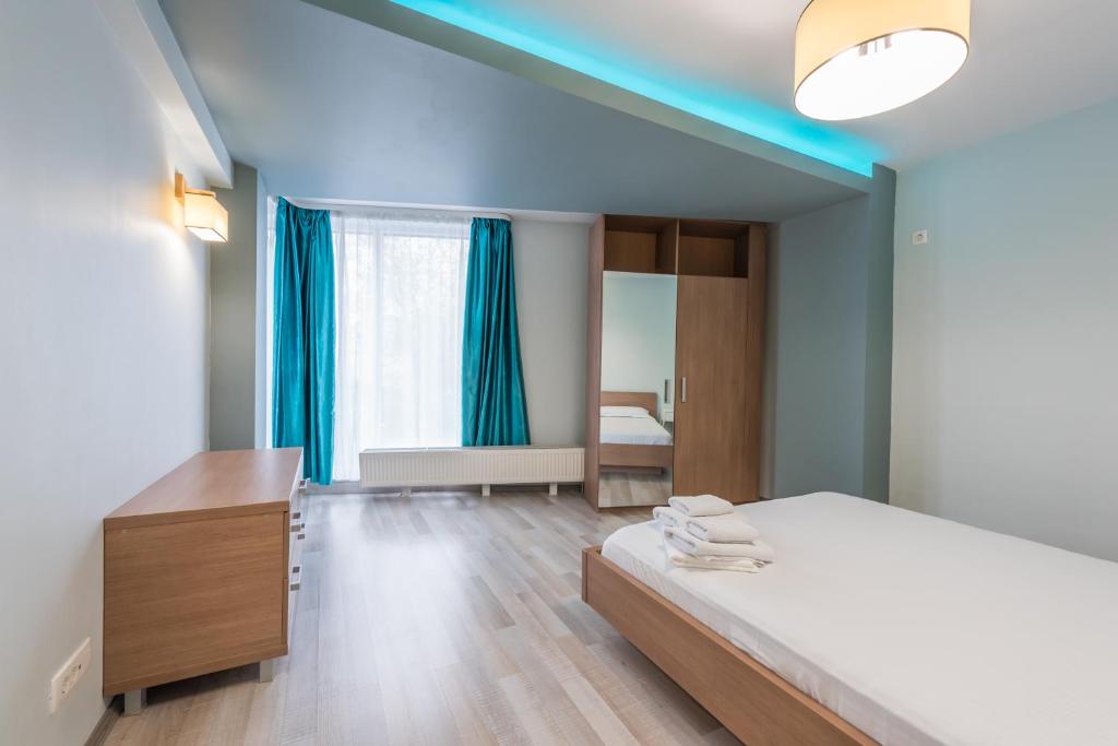 Апартаменты (Апартаменты Делюкс с 3 спальнями), Downtown Accommodation