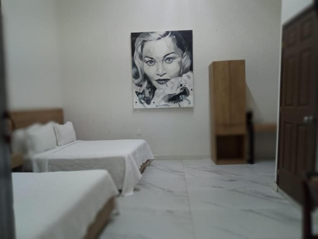Hotel Via Real - Tap to explore photos