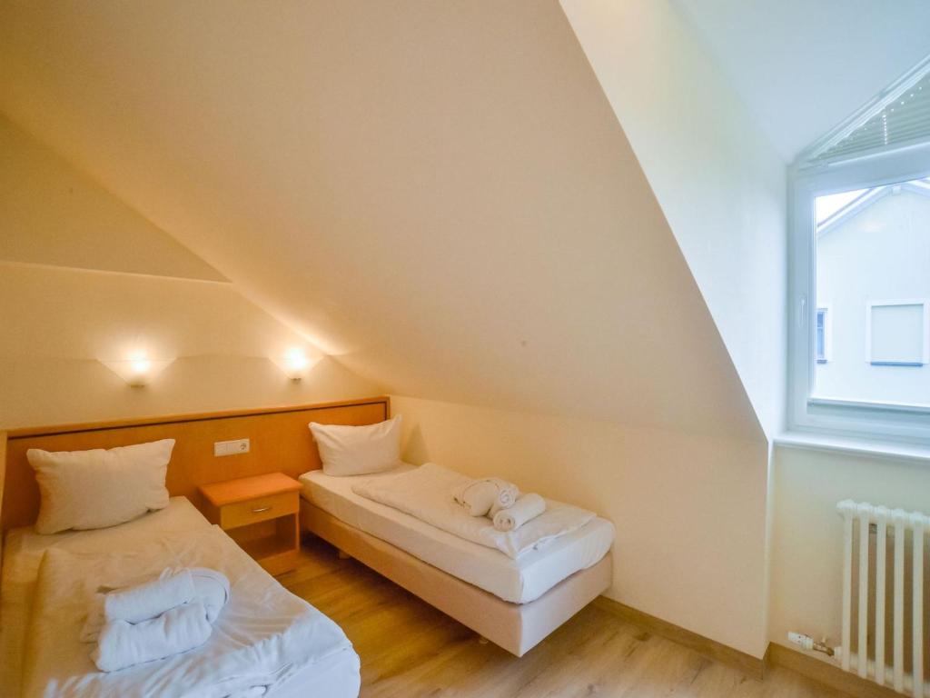 Dünenpark Binz - Komfort Ferienwohnung mit 1 Schlafzimmer und Balkon im Dachgeschoss 150 photo 3