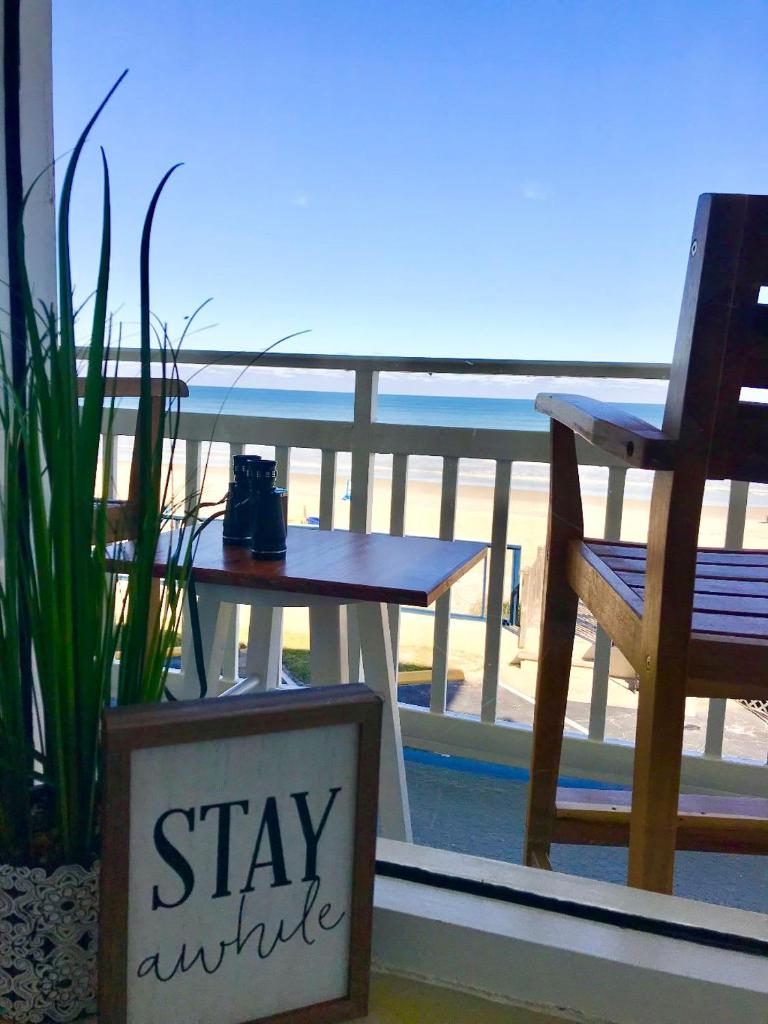 Beach Daze - Ocean front at Symphony Beach Club! photo 1