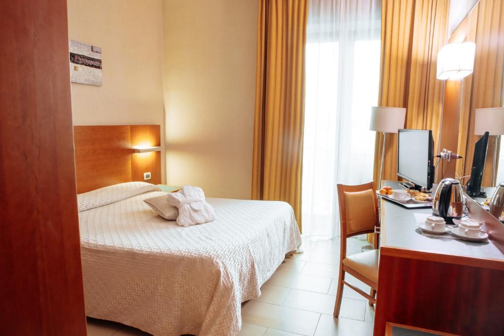 Hotel Amico - Tap to explore photos