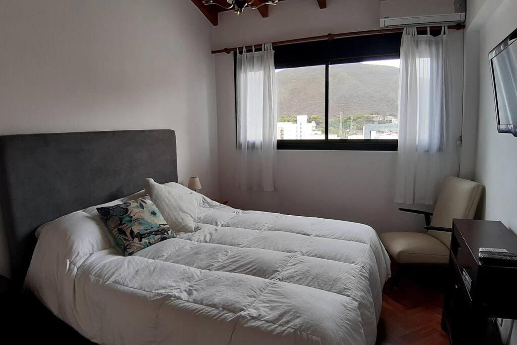 Hermoso departamento céntrico en ultimo piso, con cochera photo 1