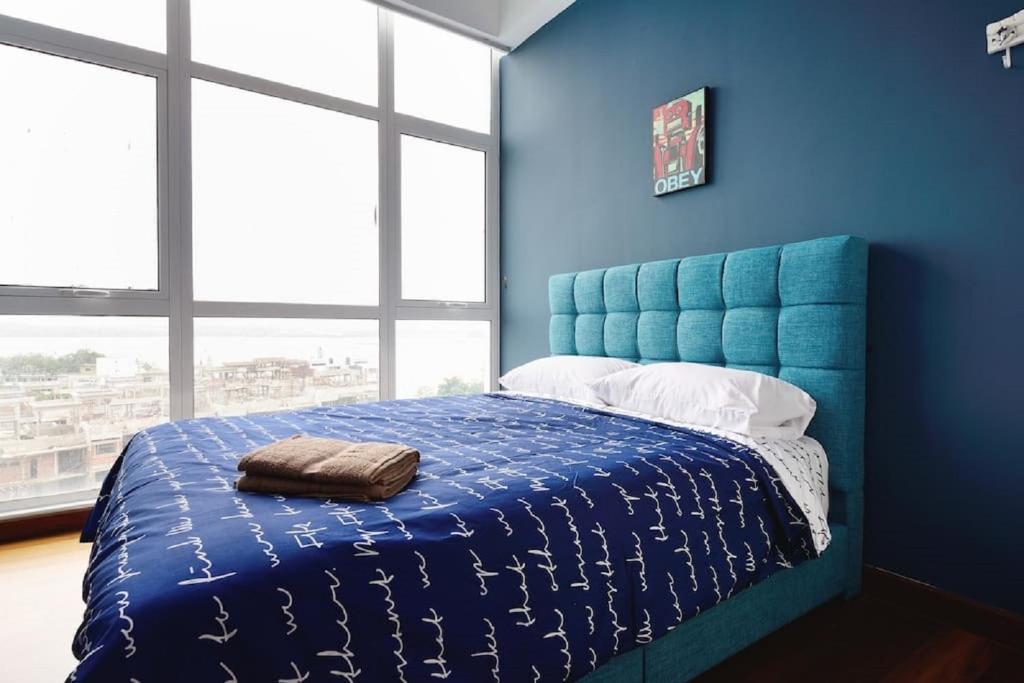 Experience the Coast - HostaHome Suites at Paragon Residence near Downtown photo 3