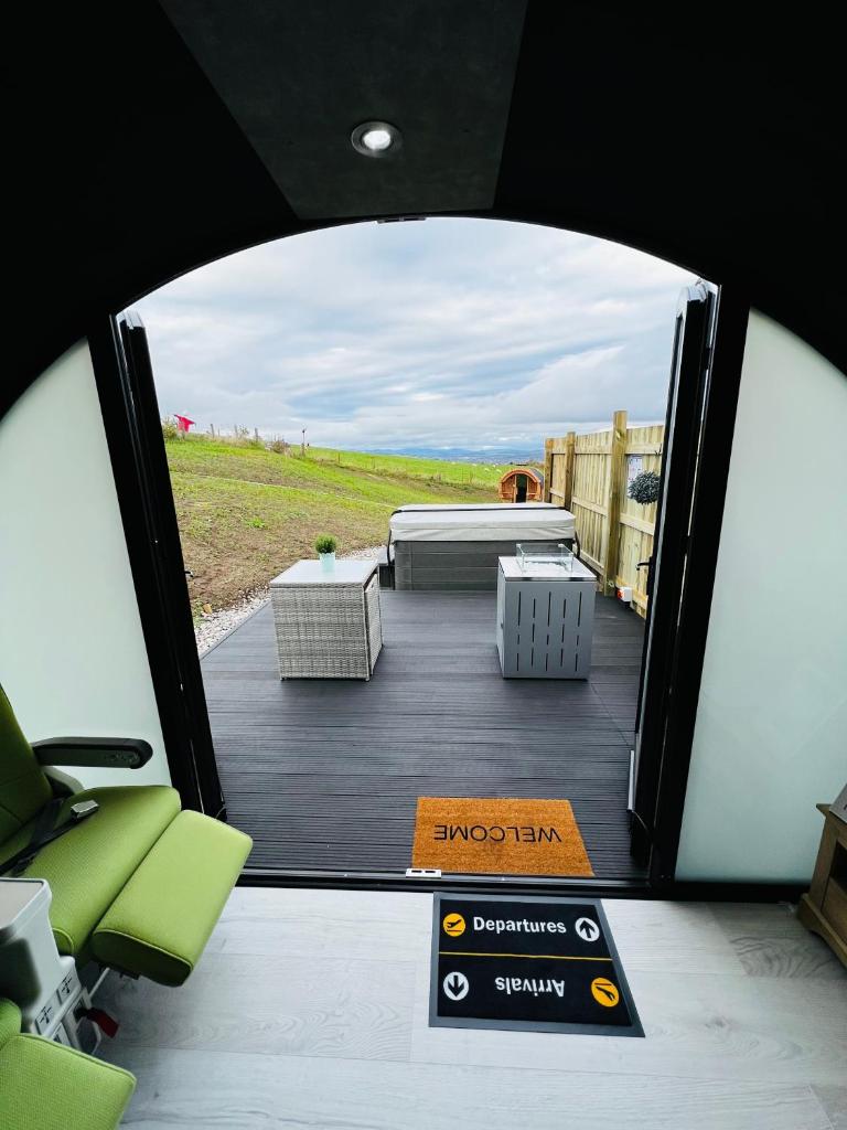 Highland Premier Glamping Pods - Tap to explore photos