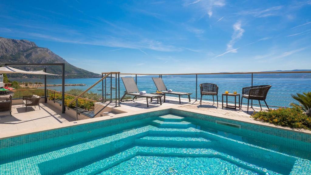 Luxury beachfront VILLA FLORES heated outdoor, indoor pool, whirlpool, sauna photo 1