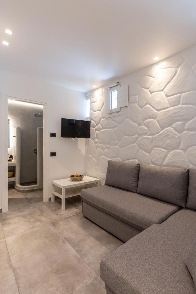 Callisti Mykonos Town with pool view and Calypso upper floor with sea view - Tap to explore photos