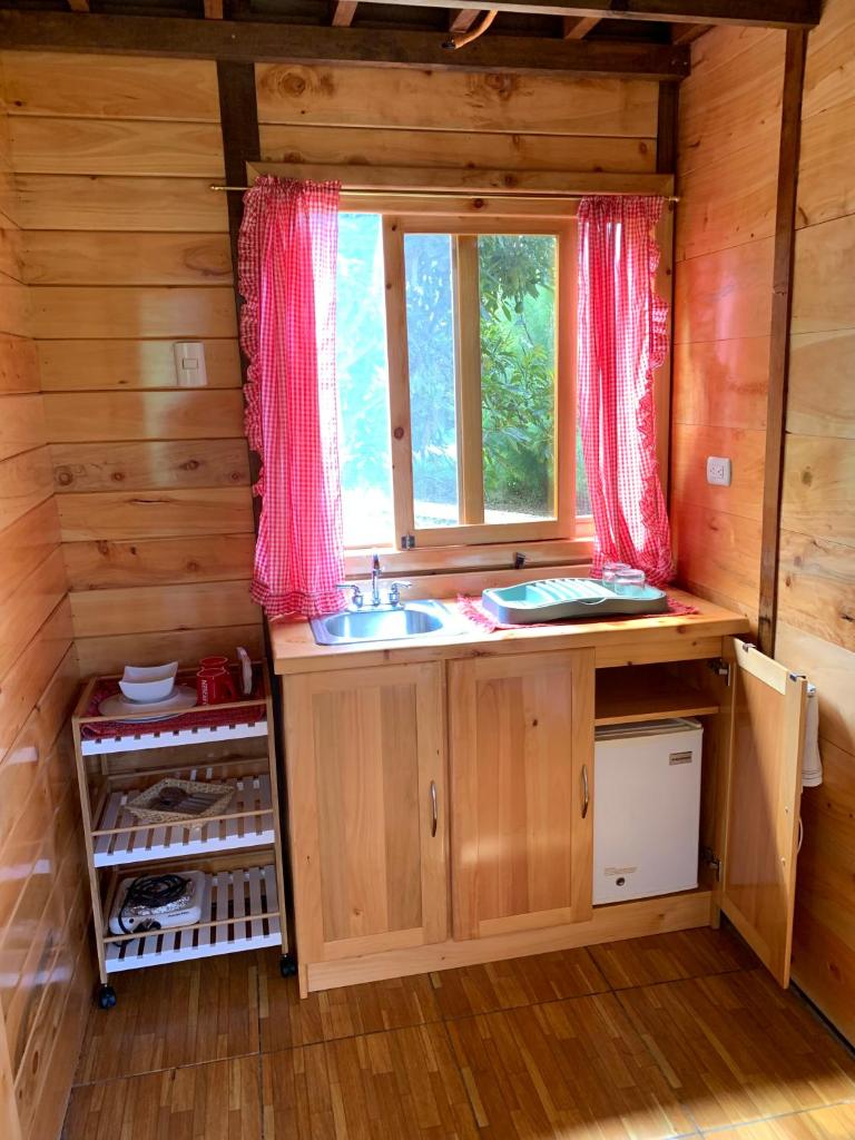 Charming cabin surrounded by nature photo 2