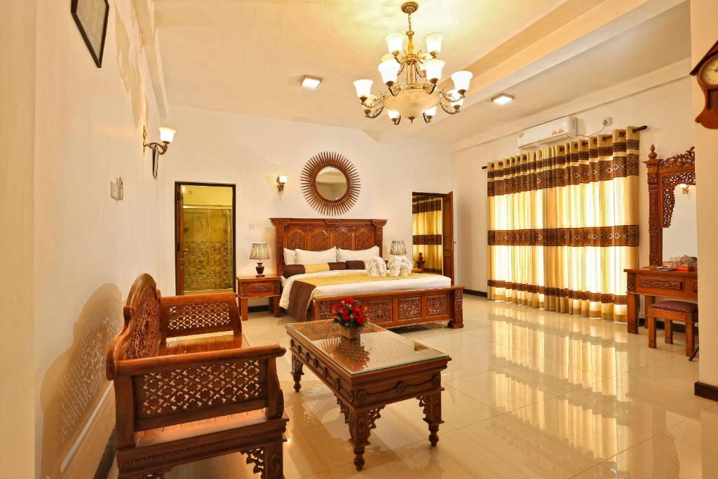 Eagle Regency Boutique Hotel - Tap to explore photos