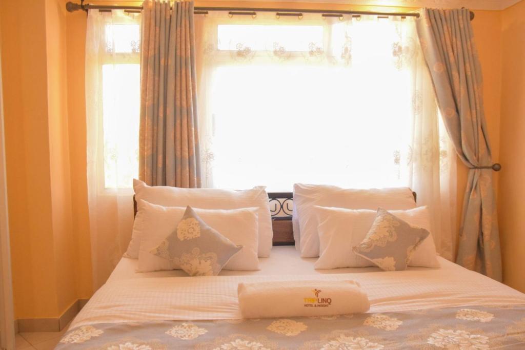 TRIPLINQ HOTEL & RESORT Meru photo 1