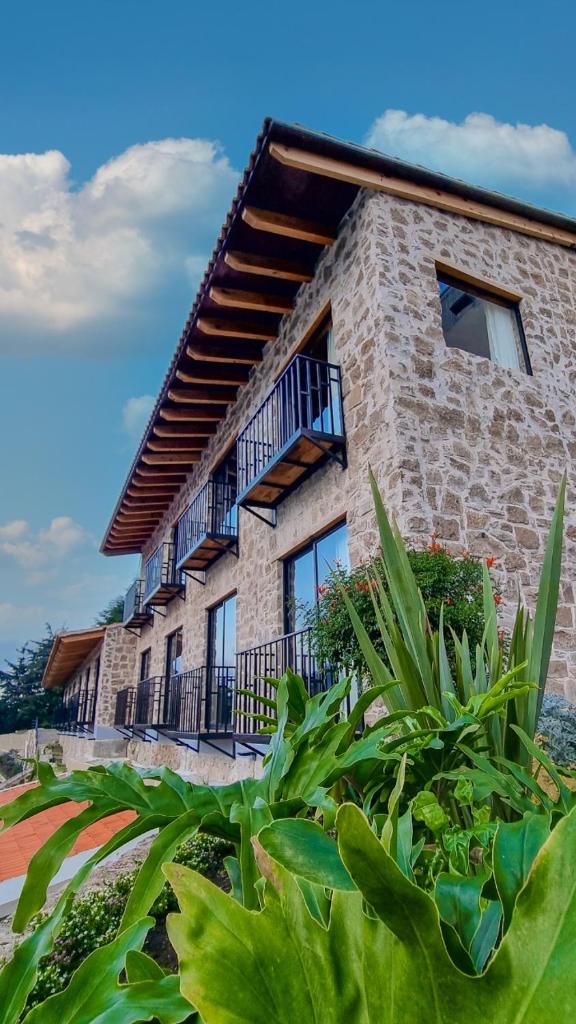 Hotel Casa Xaa - Tap to explore photos
