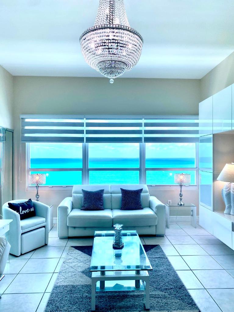 Large luxurious direct ocean front Penthouse or Deluxe one bedroom ocean front condo-free parking image
