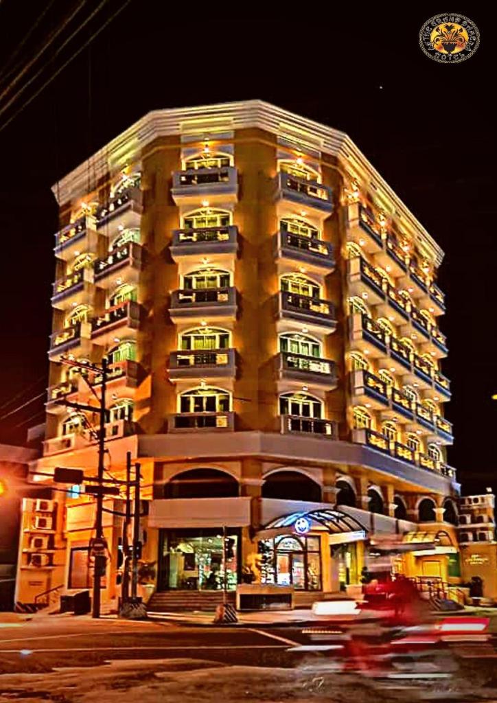 The Grand Dame Hotel - Tap to explore photos