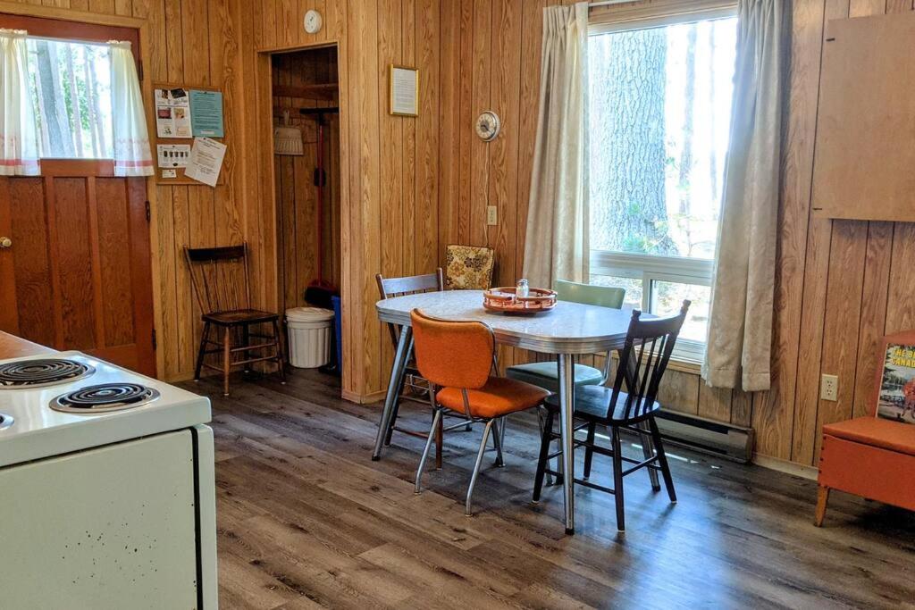Trendy, Mid-Century Styled Yellow Cottage on Sand Beach photo 4