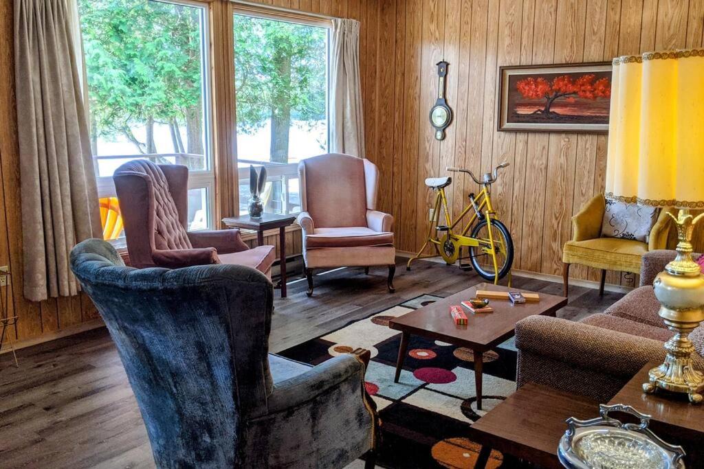 Trendy, Mid-Century Styled Yellow Cottage on Sand Beach photo 3