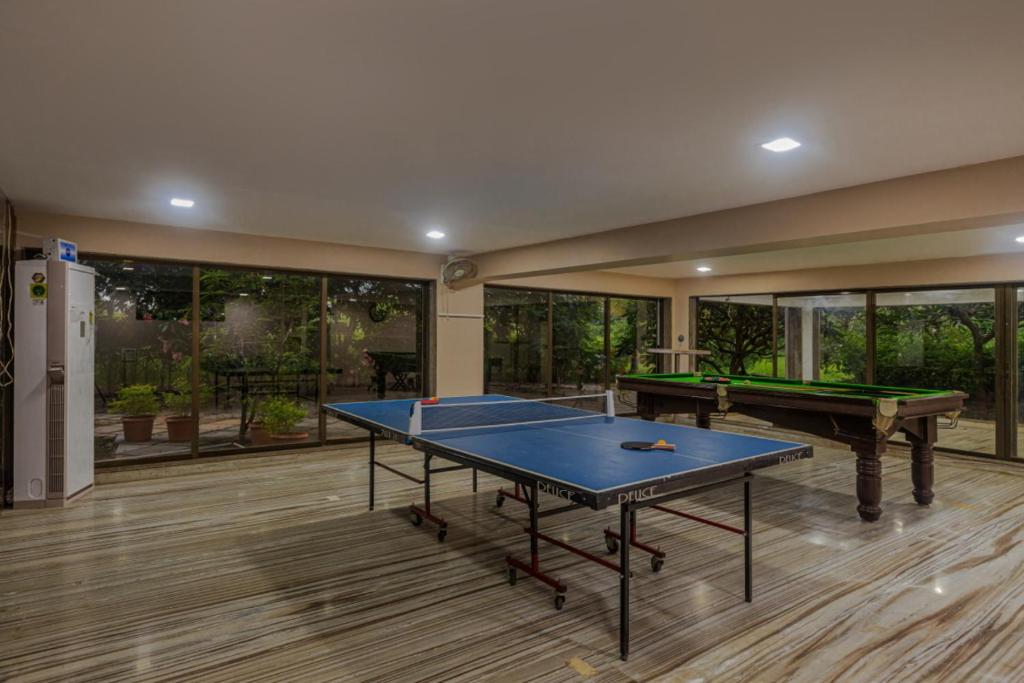 SaffronStays Aura, Alibaug - luxury pool villa with a game room and spacious lawn photo 4