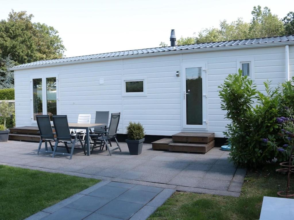 Tidy chalet with a microwave, near the Wadden Sea photo 1