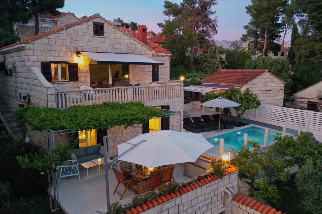 Villa Beach House Sumartin with Heated Pool photo 1