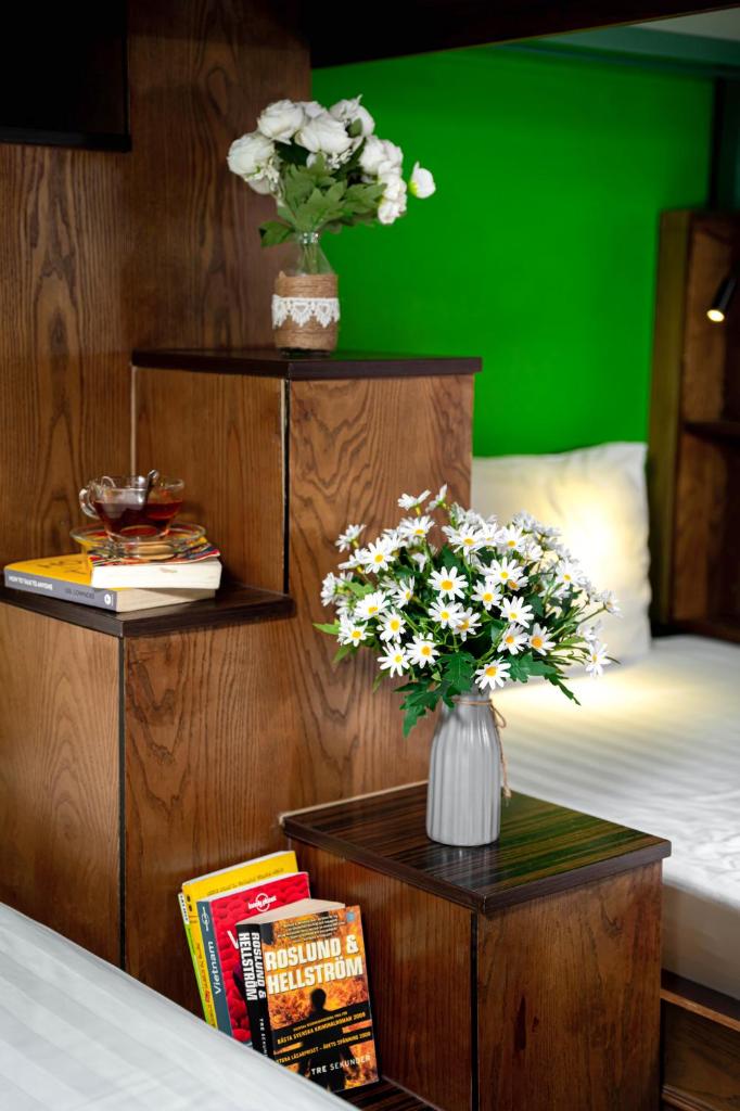 Little Charm Hanoi Hostel - Tap to explore photos