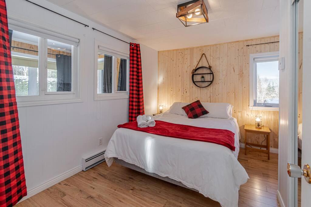 Spa, sauna et foyer : Le Phare de Baie-Saint-Paul photo 3