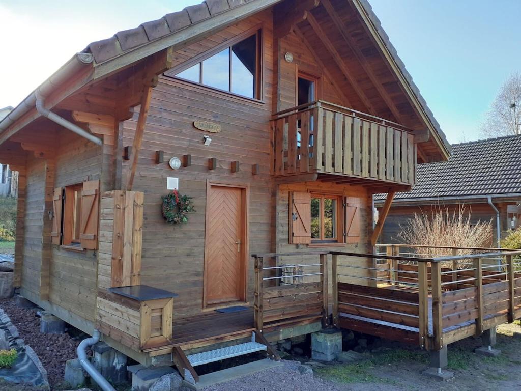 Wooden chalet in Vosges by a pond photo 3