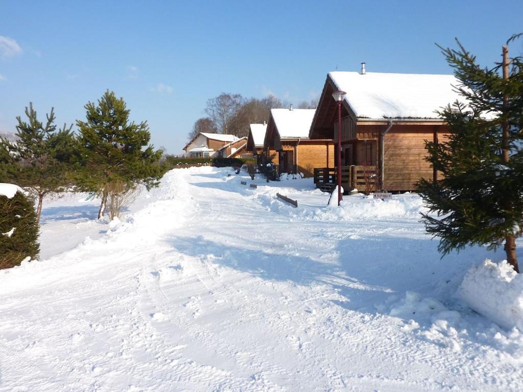 Wooden chalet in Vosges by a pond photo 2