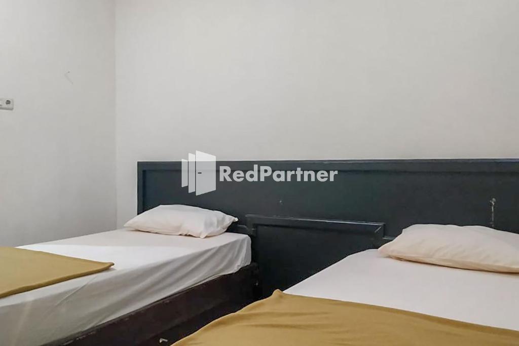 Palu City Guest House Mitra RedDoorz
