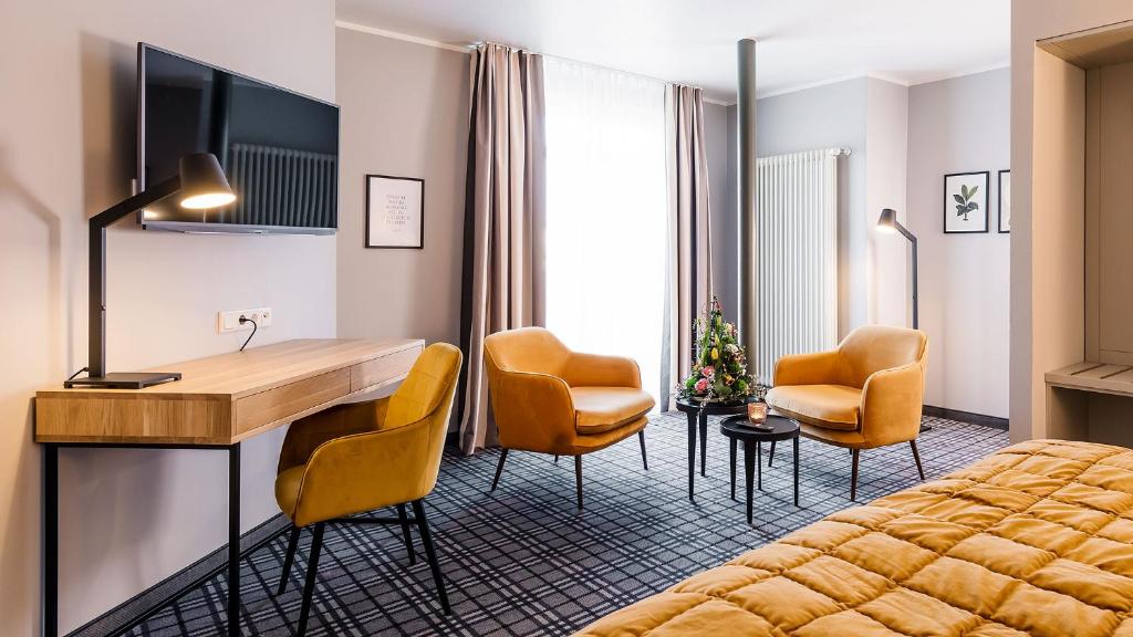Hotel Ambiente - Tap to explore photos