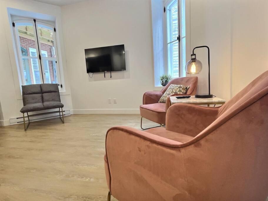 Appartement prestigieux en plein centre-ville! photo 2