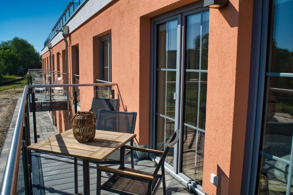 Schicke FeWo nahe dem Seglerhafen, Balkon - Alte Fischfabrik Lauterbach FeWo 19 photo 1