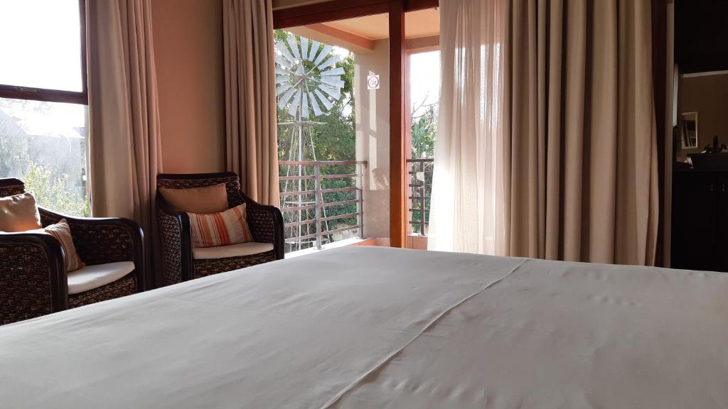 Karoo Sun Boutique Guest House - Tap to explore photos