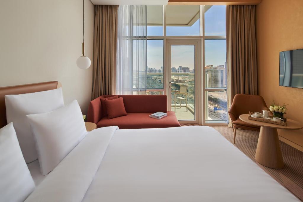 Novotel Jumeirah Village Triangle - Tap to explore photos