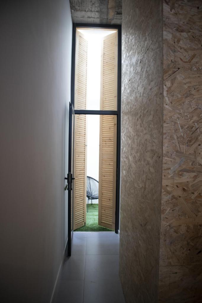 Apartamento encantador com pequeno pátio escondido photo 1